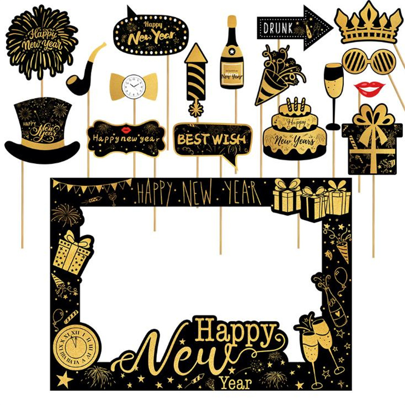 Close-up of novelty party glasses props beside printed best-wishes greeting card face