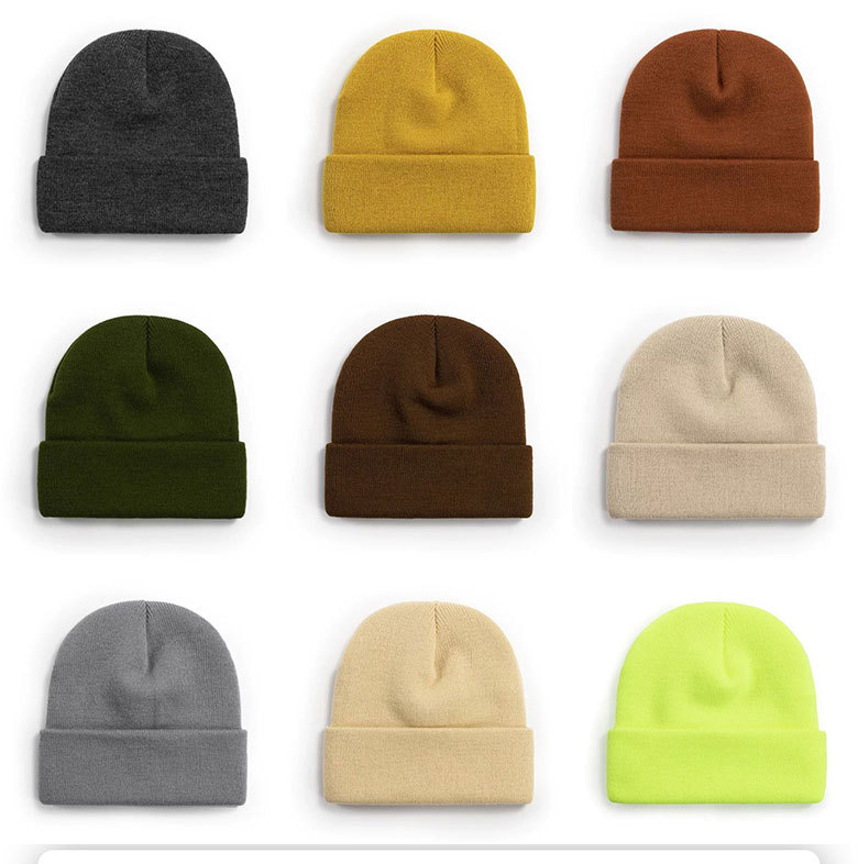 nine blank cuffed beanies with smooth crowns in charcoal, mustard, rust, olive, brown, oatmeal, grey, cream and lime in a grid